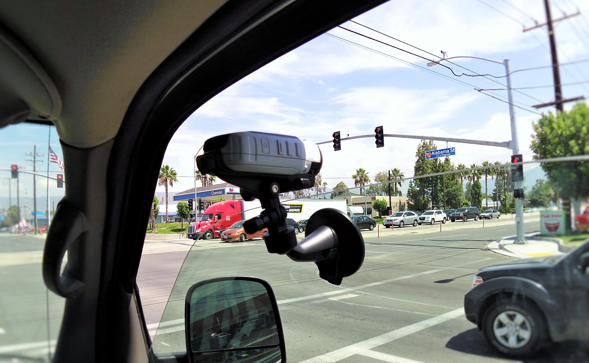 Camera capturing street-level photos from a vehicle